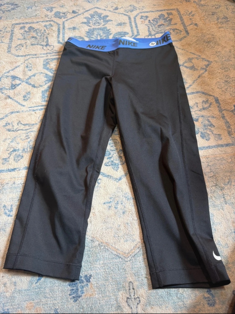 Nike women’s Black Capri Leggings with Blue Branded Waistband